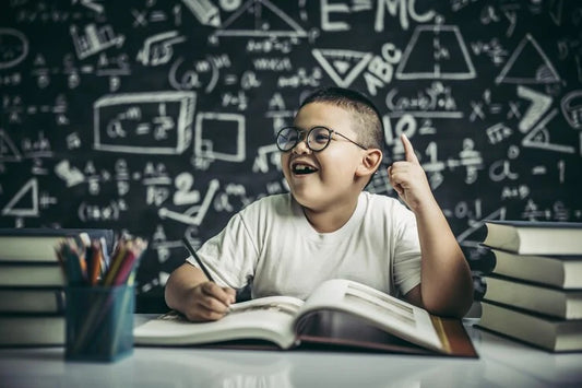 seorang anak sedang belajar di meja, image source: https://img.freepik.com/free-photo/boys-with-glasses-write-books-think-classroom_1150-24950.jpg?t=st=1718785139~exp=1718788739~hmac=6327f253c2cecb984d981de5a9f2c2a87f11c1ab3c971292839de0e49d685967&w=740