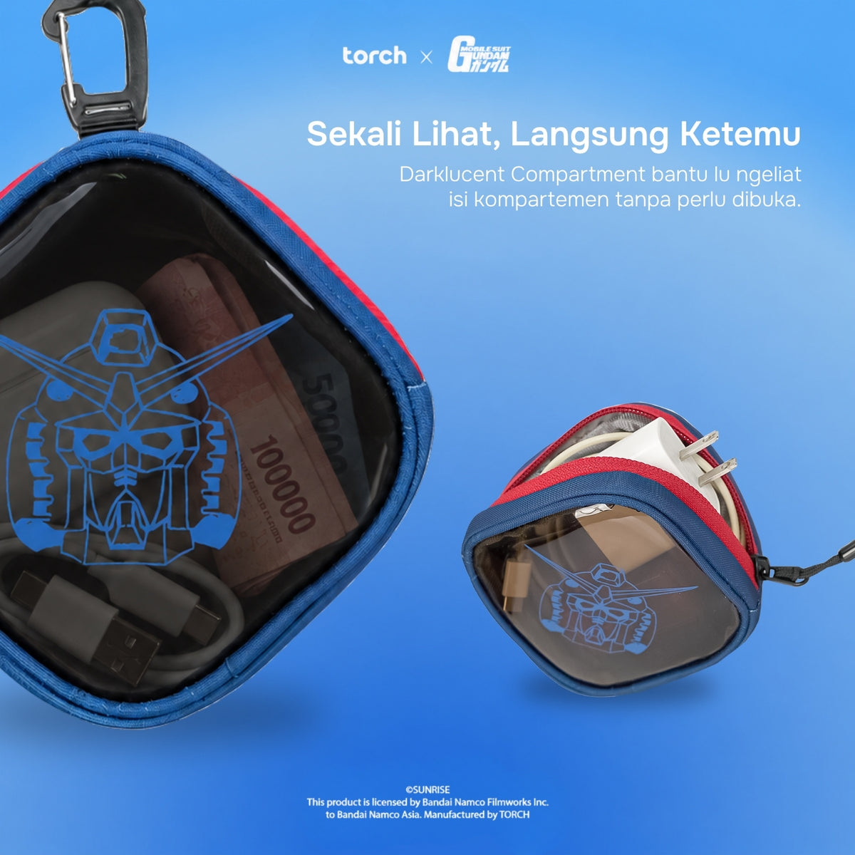 A blue translucent zippered pouch with red trim and a black carabiner clip, shown open and closed on a blue gradient background. The pouch has a dark interior compartment and a blue Gundam helmet graphic printed on the front.