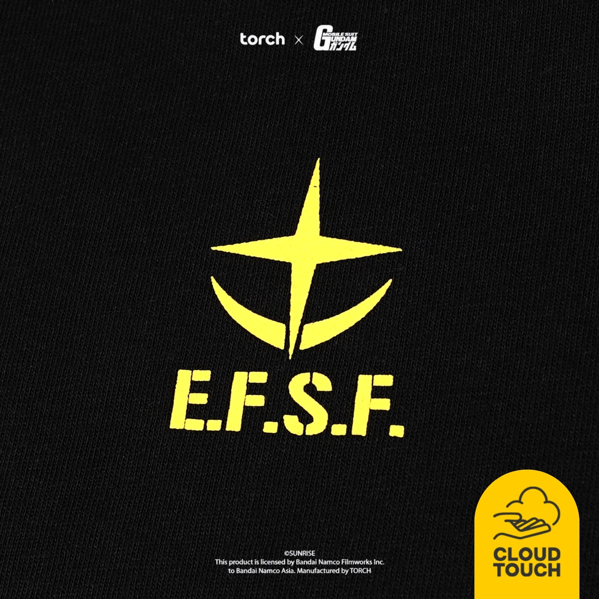 Black textured fabric with a large yellow E.F.